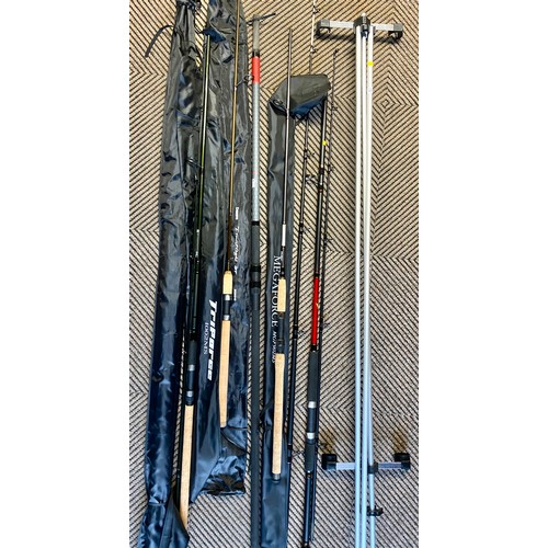 477 - Two Daiwa 9ft fly rod, two spinning rods, two beach casting rods, and a beach rod stand