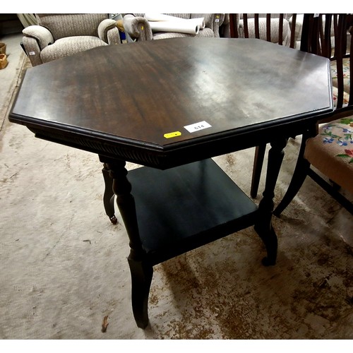 614 - Octagonal mahogany occasional table with shelf on casters, surface diameter 75cm x 75cm