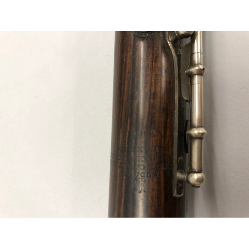 369 - Ruddall, Rose Carte & Co rosewood flute, stamped on the barrel, 'Ruddall, Rose Carte & Co Lo... 