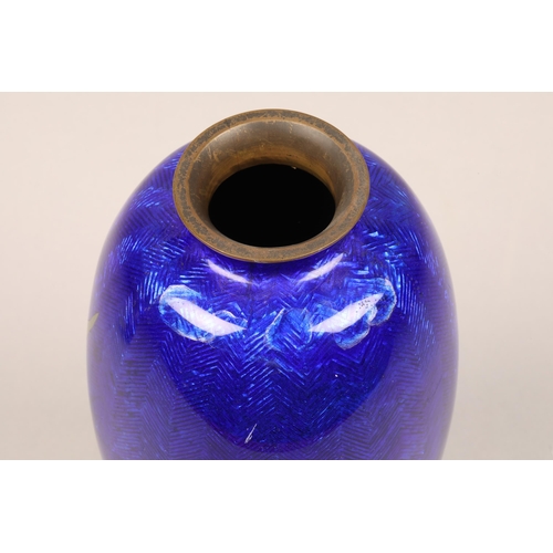 266 - Japanese cloisonne vase, baluster form, blue ground decorated with flowing iris, height 24cm