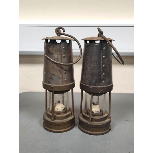 281 - Two Miners Lamps by Patterson Lamps Ltd, Gateshead on Tyne, Type B7. Brass lower body, makers plaque... 