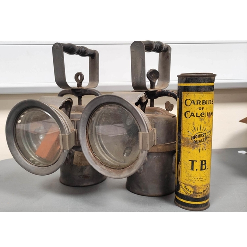 282 - Two carbide Lamps by The Premier Lamp and Engineering Co Leeds with pewter bodies and wooden carry h... 