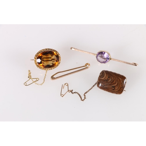 539 - 9ct gold amethyst set bar brooch, 6cm, and another, 5.9g, also two brooches in yellow metal settings... 