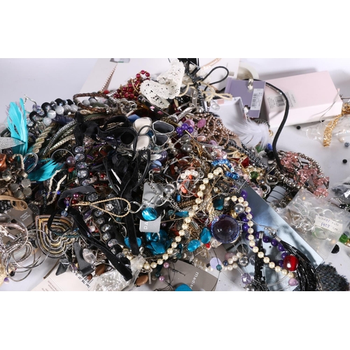 549 - Large quantity of costume jewellery, to include beads, bracelets, etc. 