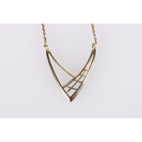 562 - 9ct gold stylised wishbone pendant, on 9ct gold chain, 6.5g.