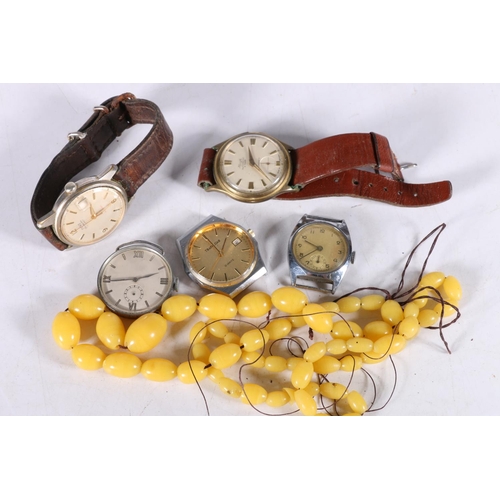 572 - Five gentleman's wrist watches to include Fero, Trafalgar, etc., and two strands of amber style bead... 