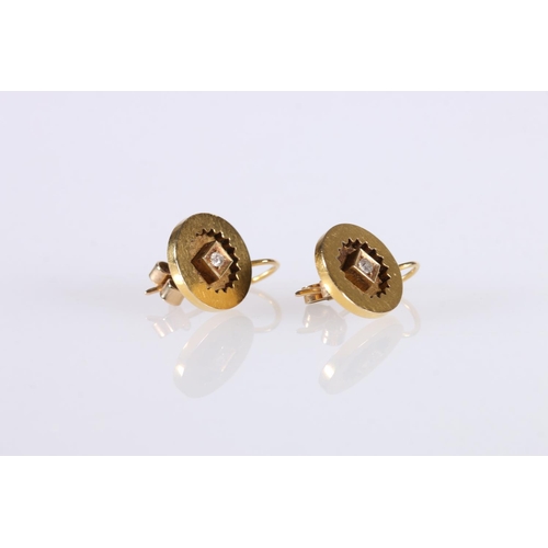 576 - Pair of 15ct gold earrings with diamond chips to centre, 1.3cm, 2.7g.