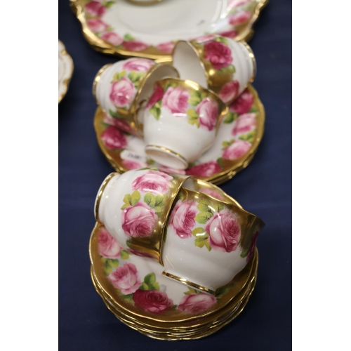 62 - Havilland of France part dessert set, and a Royal Albert cabbage rose pattern floral teaset.