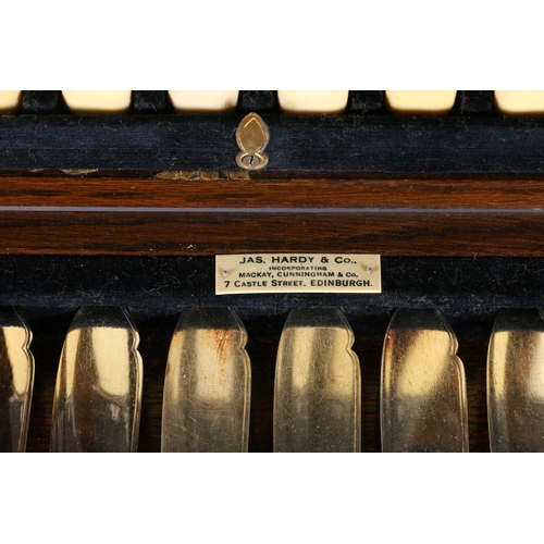 63 - Cased fish knives and forks with ivorine handles in fitted case, (lacking one fork).