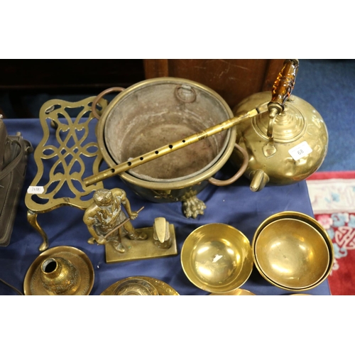 68 - Brass ware to include an amber style handled coffee pot, a kettle, a jardinière, a double tri... 