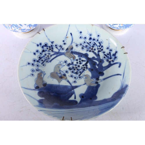 80 - 19th century Chinese blue and white plate depicting bird amongst prunus bush, 24cm diameter, and two... 