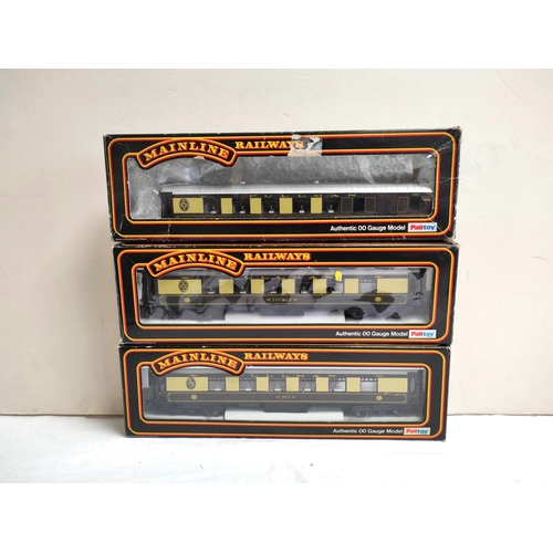 125 - Six boxed Mainline 00 gauge locomotives and rolling stock to include 57XX Pannier Tank Locomotive BR... 