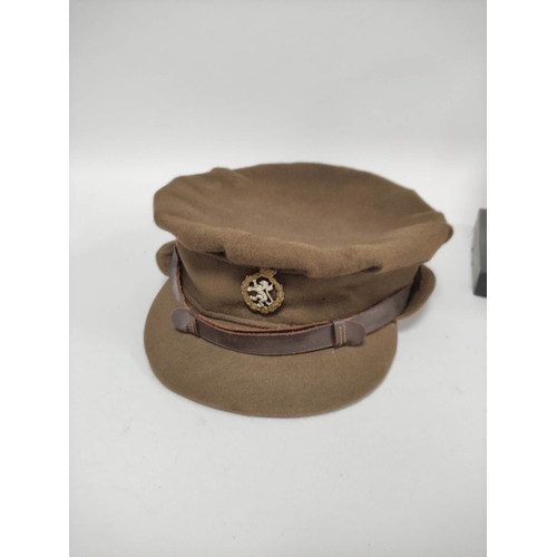 220 - Two military soft caps to include a WW2 era RAF cap and a khaki cap bearing W.R.A.C badge. (2)