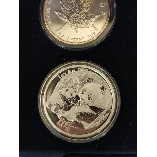 182 - 2005 World four fine silver 1oz coins to include Canadian Maple Leaf, American Eagle, Chinese Panda ... 