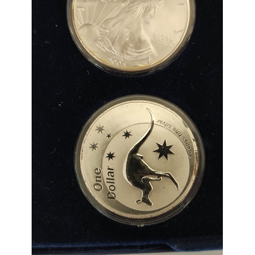 182 - 2005 World four fine silver 1oz coins to include Canadian Maple Leaf, American Eagle, Chinese Panda ... 