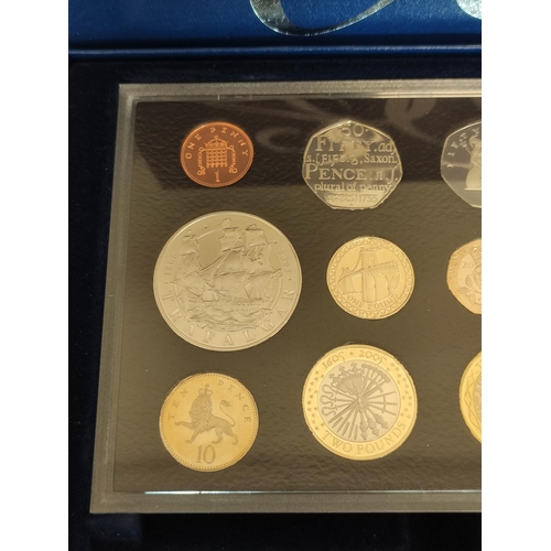 184 - United Kingdom. 2005 boxed Proof Coin Set and another dated 1997. (2)