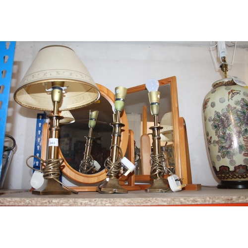 340 - Two pine dressing table mirrors and three brass table lamps, one with shade.