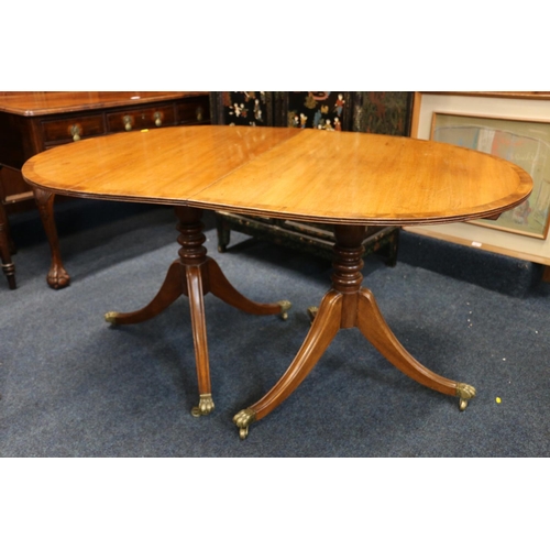 708 - Mahogany Regency style D-end dining table, with centre leaf.