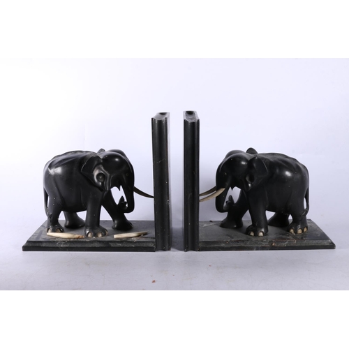 110 - Ebony elephant bookends, 18cm high.