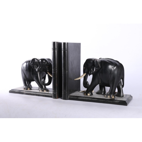 110 - Ebony elephant bookends, 18cm high.