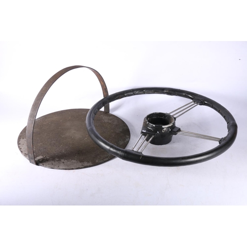 115 - Steering wheel, 42cm, and a griddle.