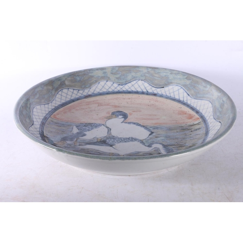 122 - Highland Stoneware bowl, with bird decoration to centre.