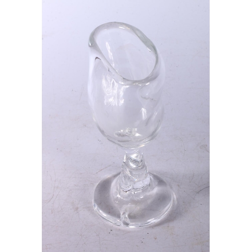 123 - Art Glass wine goblet of abstract form, 19cm high.