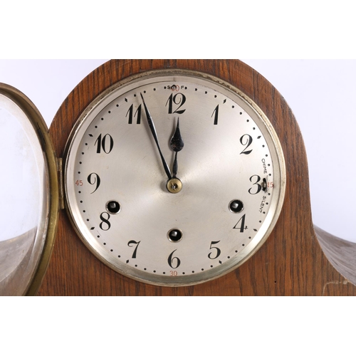 125 - 1920s/30s oak tambour mantel clock, 23cm.