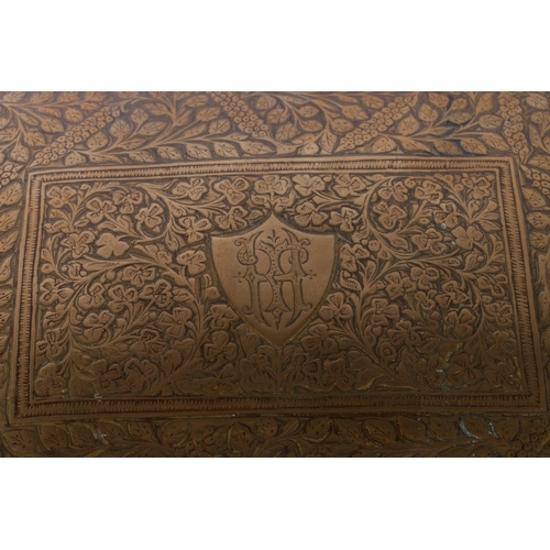 188 - Brass and enamel flower engraved cigarette box.