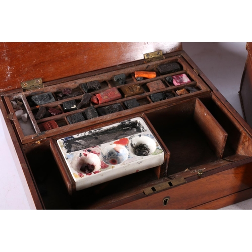 255 - Artist's mahogany box with lift-out trays containing paints, another smaller, a Rowney pocket paint ... 