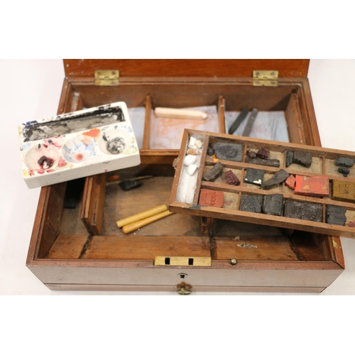 255 - Artist's mahogany box with lift-out trays containing paints, another smaller, a Rowney pocket paint ... 