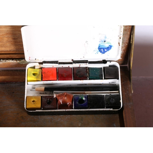 255 - Artist's mahogany box with lift-out trays containing paints, another smaller, a Rowney pocket paint ... 