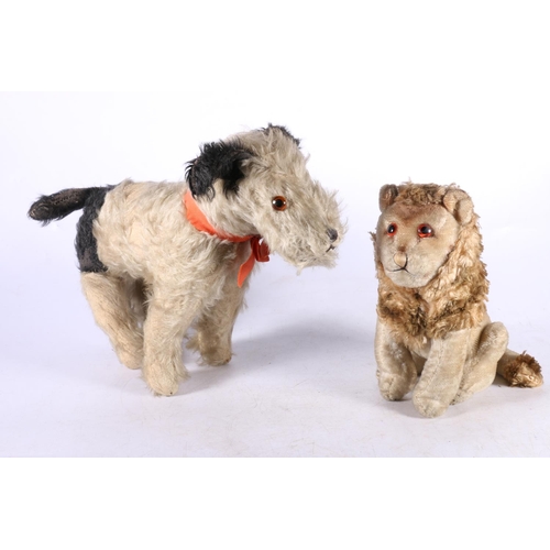 287 - Vintage toy dog, 26cm high, and a lion.