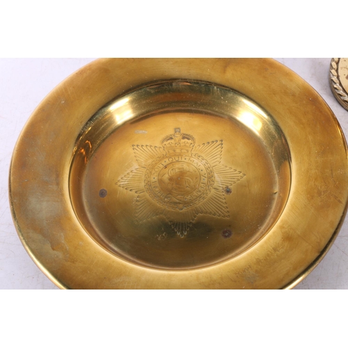 304 - Cheshire Regiment brass dish, another military dish, and a doorknob.