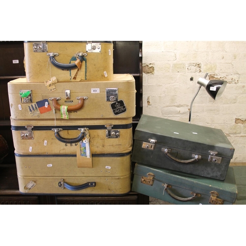 653 - Six vintage traveling cases, some with vintage labels.