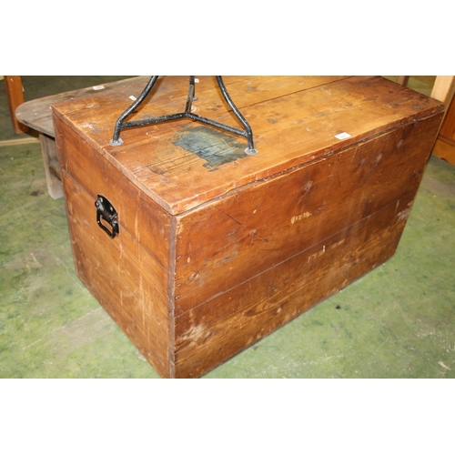 664 - Pine chest with drop handles to side, 58 x 93 x 54cm.