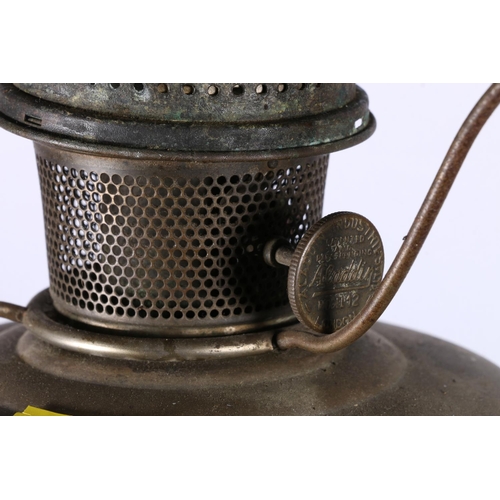 101 - Converted oil lamp, marked Aladdin, on pierced base with paw feet, 75cm to top of shade.