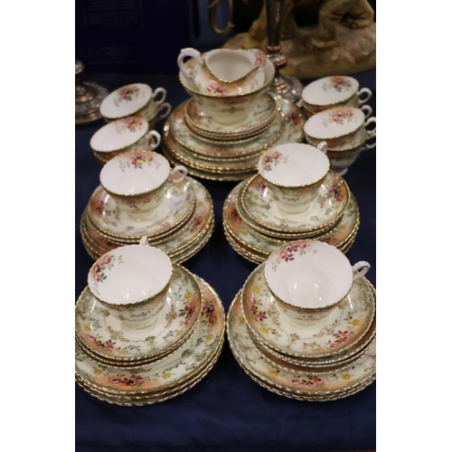 108 - Late 19th/early 20th century teaset with gilt and floral decoration to include cups, saucers, plates... 