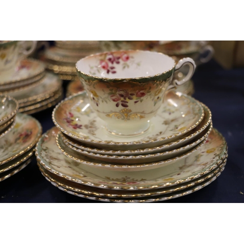 108 - Late 19th/early 20th century teaset with gilt and floral decoration to include cups, saucers, plates... 