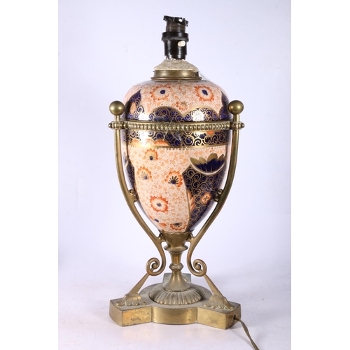 99 - Converted table lamp, Imari palette ceramic body on brass frame, 42cm high, along with Booths China.... 