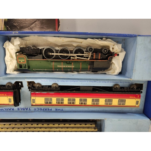 131 - Hornby Dublo. 00 gauge boxed Duchess of Montrose EDP12 electric train set. Also a box of 00 gauge tr... 