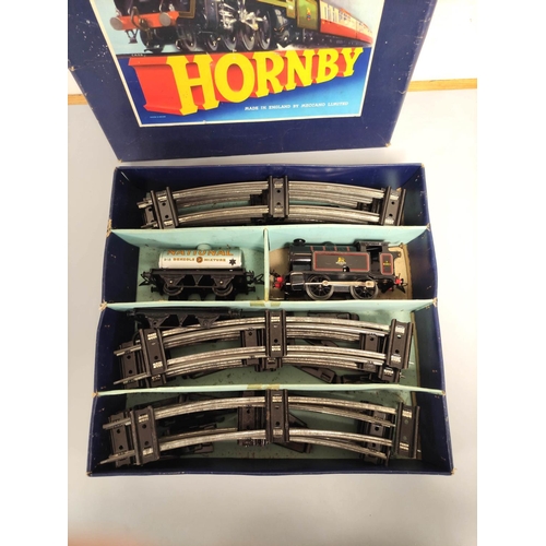 132 - Hornby. Boxed 0 gauge boxed clockwork train set comprising of track, and type 40 locomotive.... 