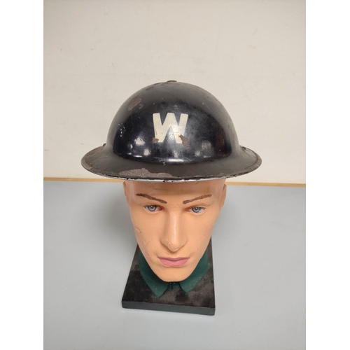 219 - WW2. Home Front Air Raid Wardens brodie helmet in black paint finish with applied white W.... 