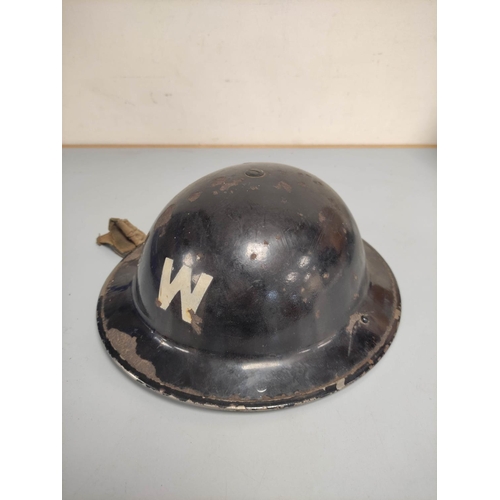 219 - WW2. Home Front Air Raid Wardens brodie helmet in black paint finish with applied white W.... 