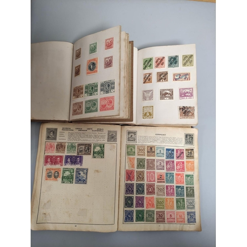 257 - Box containing an assortment of world stamp albums and guides. 