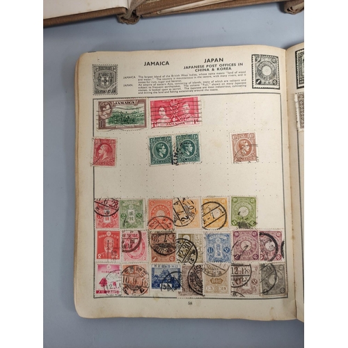 257 - Box containing an assortment of world stamp albums and guides. 