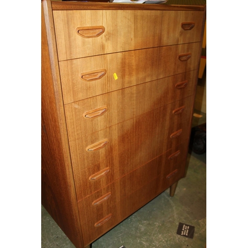 660 - Teak high chest of drawers on turned supports, 112 x 77 x 43cm.