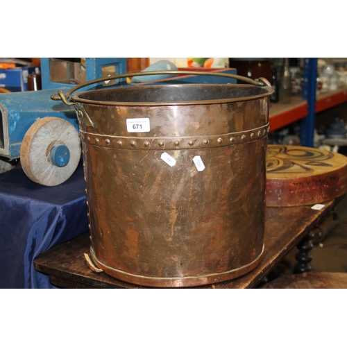 671 - Copper log bin with swing handle, 31cm excluding handle. 