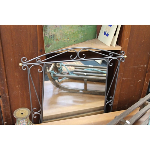 703 - Contemporary wall mirror with metal frame, 113cm x 65cm.