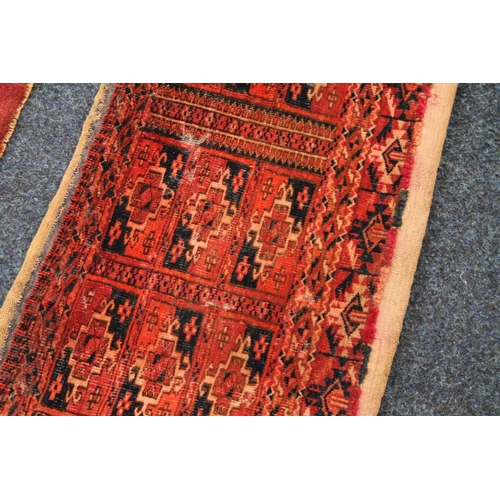 711A - Two 19th century Turkmen/Caucasian rugs, larger, 92cm x 30cm.